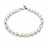 Classic pearl bracelet with sterling silver fish.