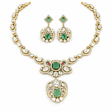 Silver necklace with earrings featuring green gemstones