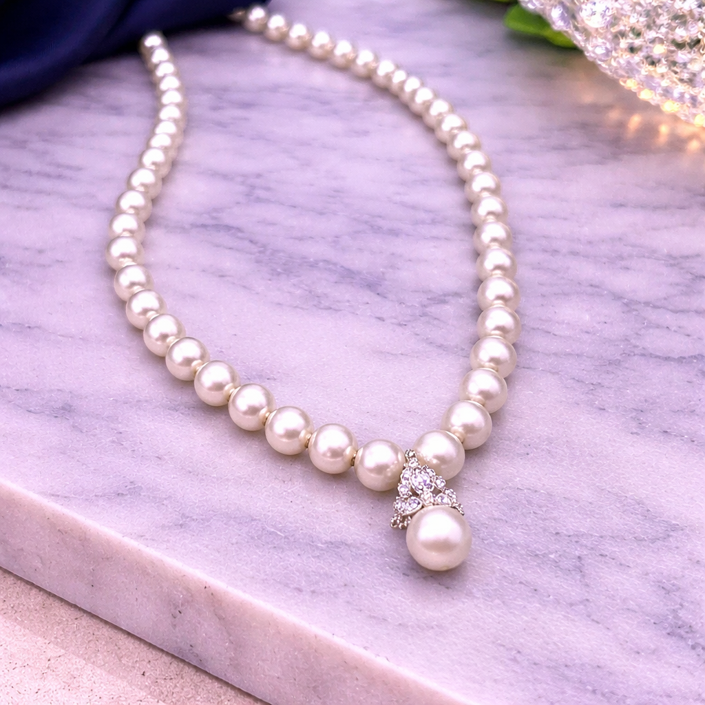 Silver White pearl necklace with a teardrop diamond pendant