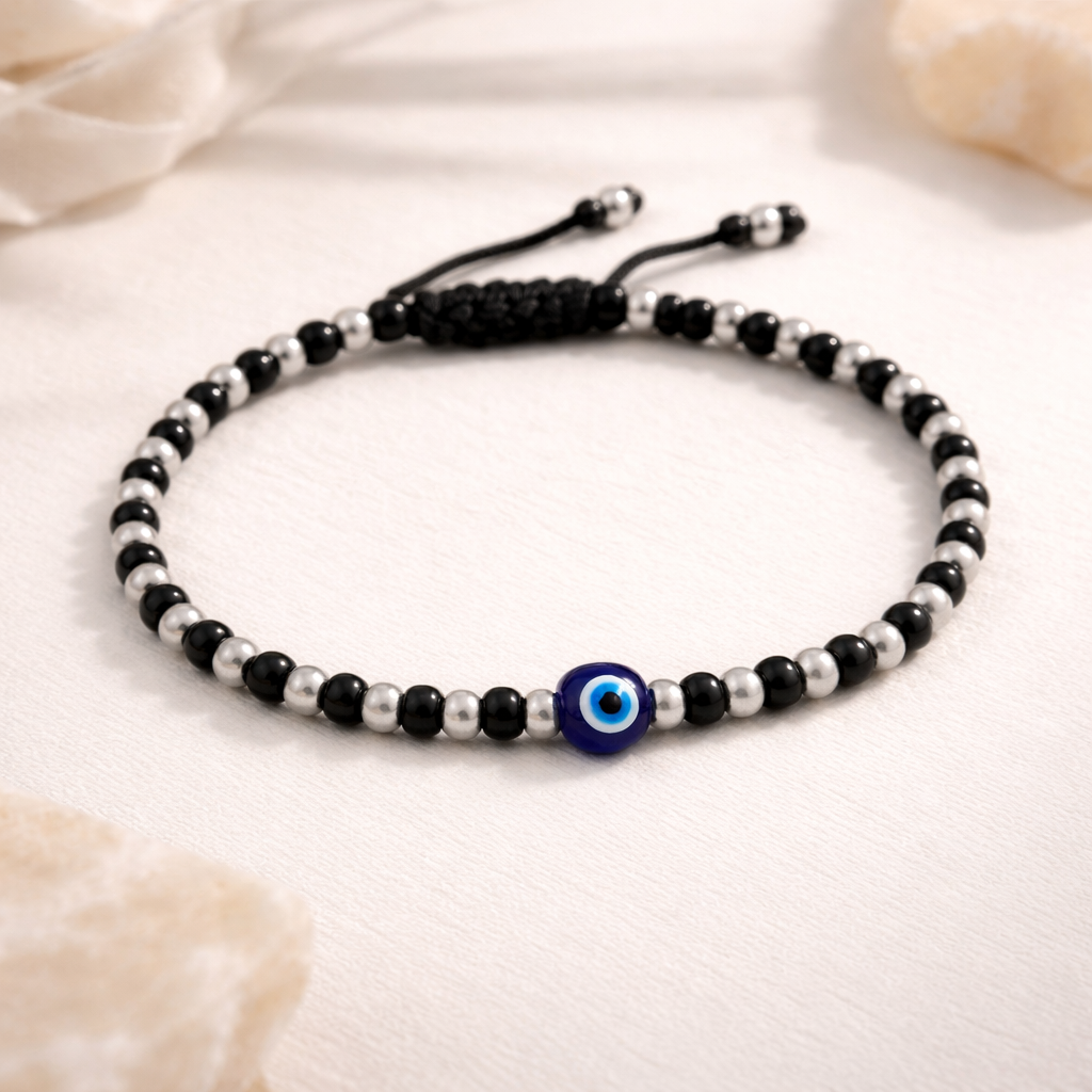 Black and silver beaded evil eye charm bracelet