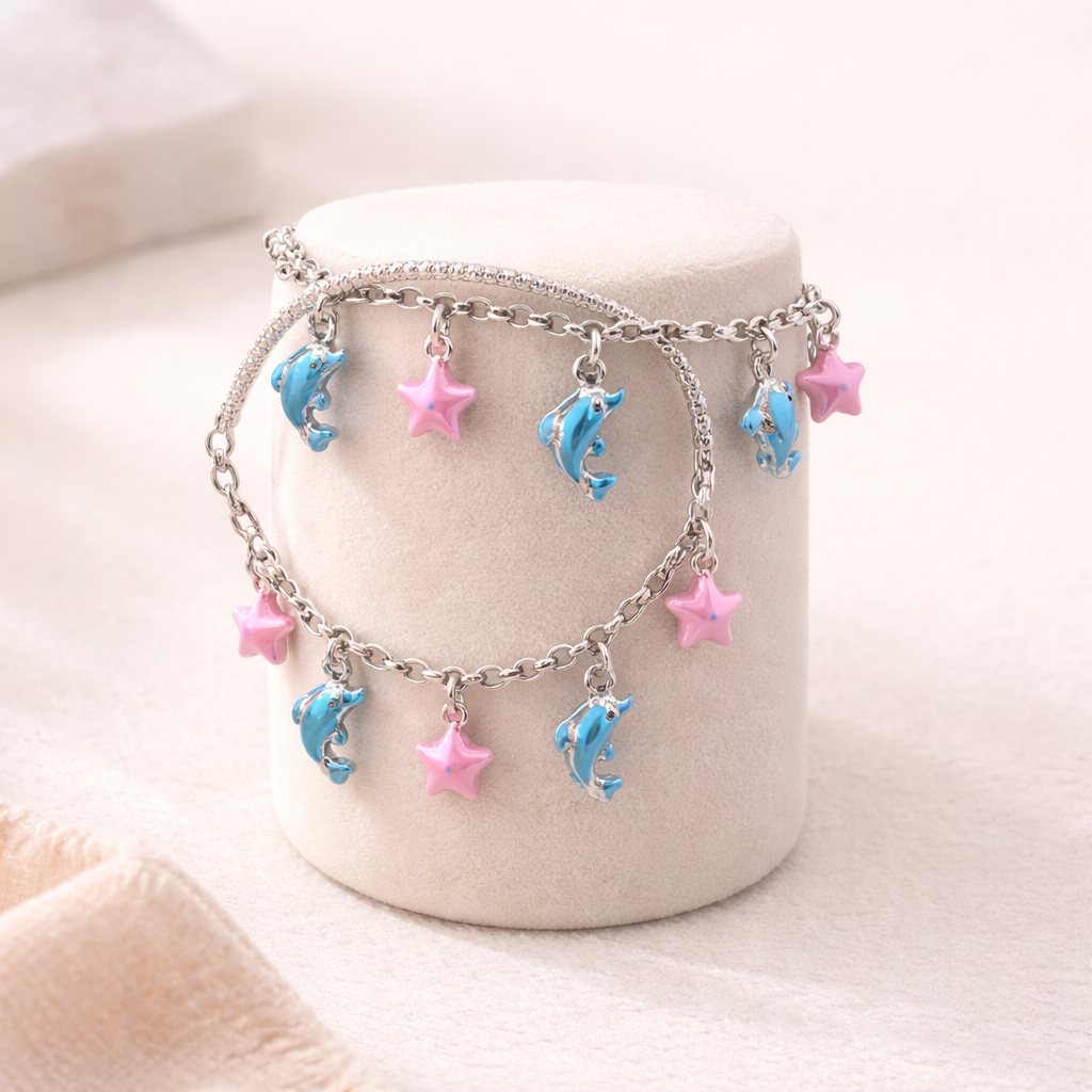 Silver bracelet with dolphin and star charms 