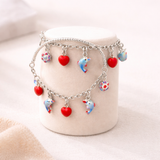 Silver baby Bracelet with heart and dolphin charms 