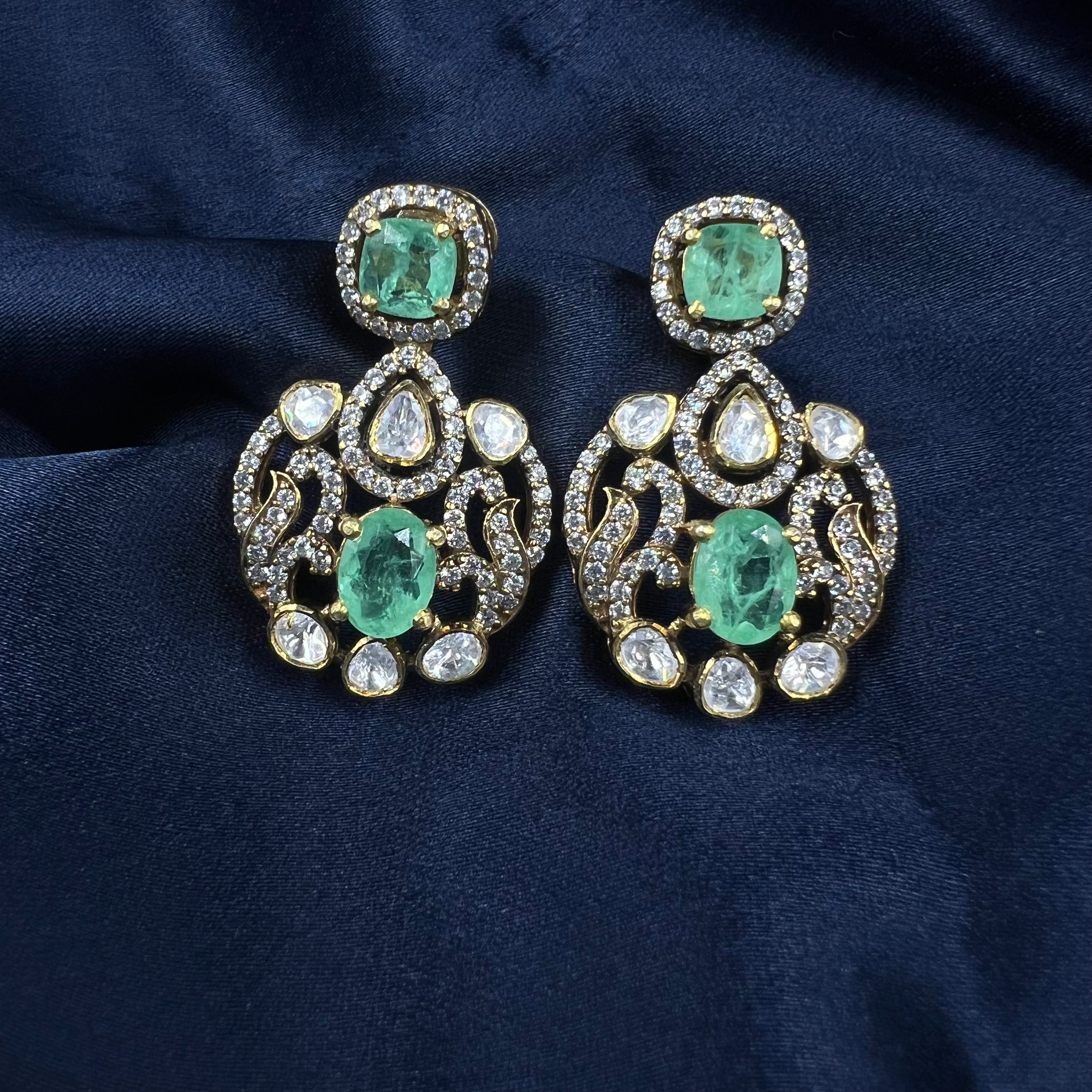 Pair of emerald Green stone silver earrings 