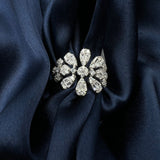 Silver brooch with teardrop-shaped crystals 