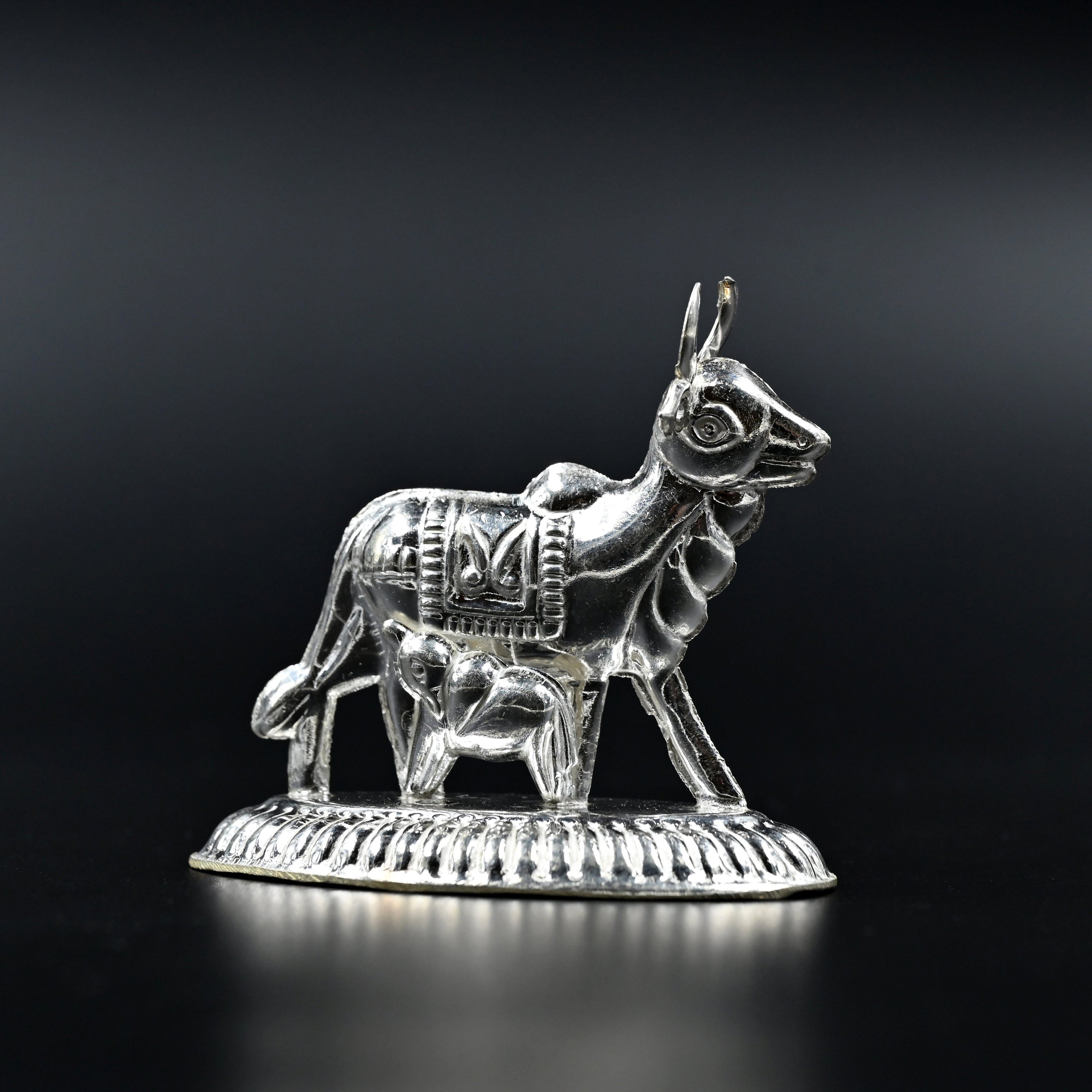 Kamdhenu pure silver idol