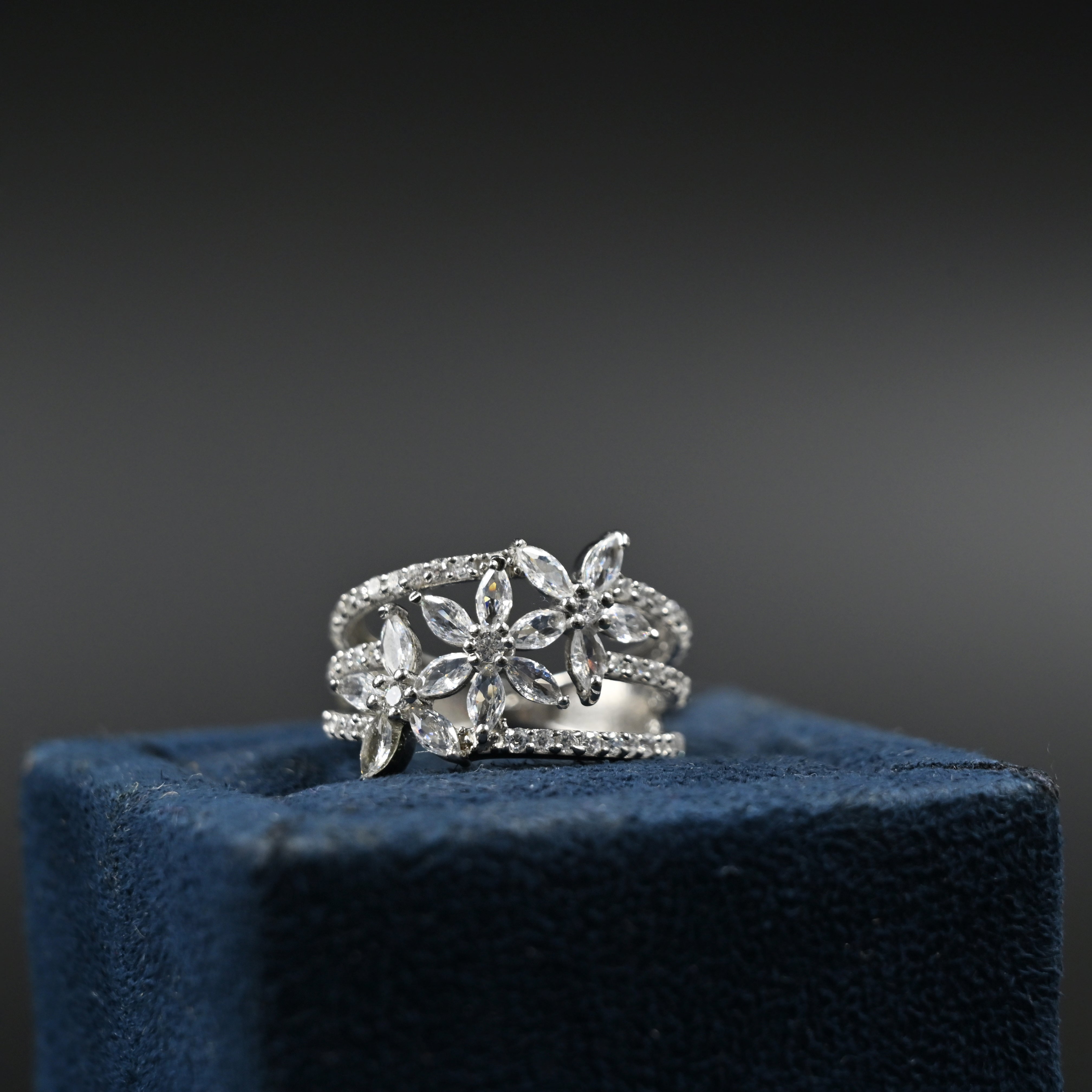 Delicate floral silver ring design