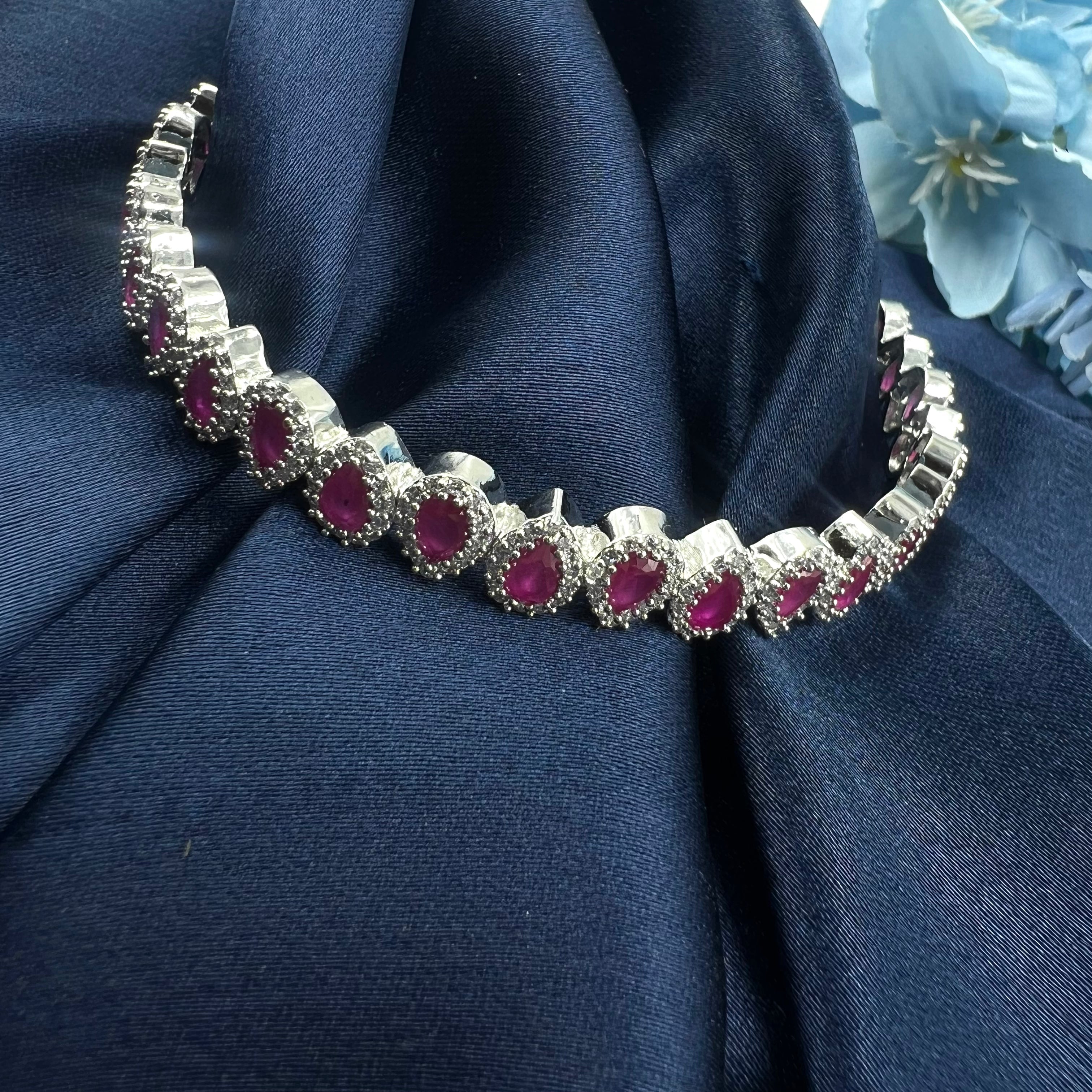 designer elan ruby silver bangles