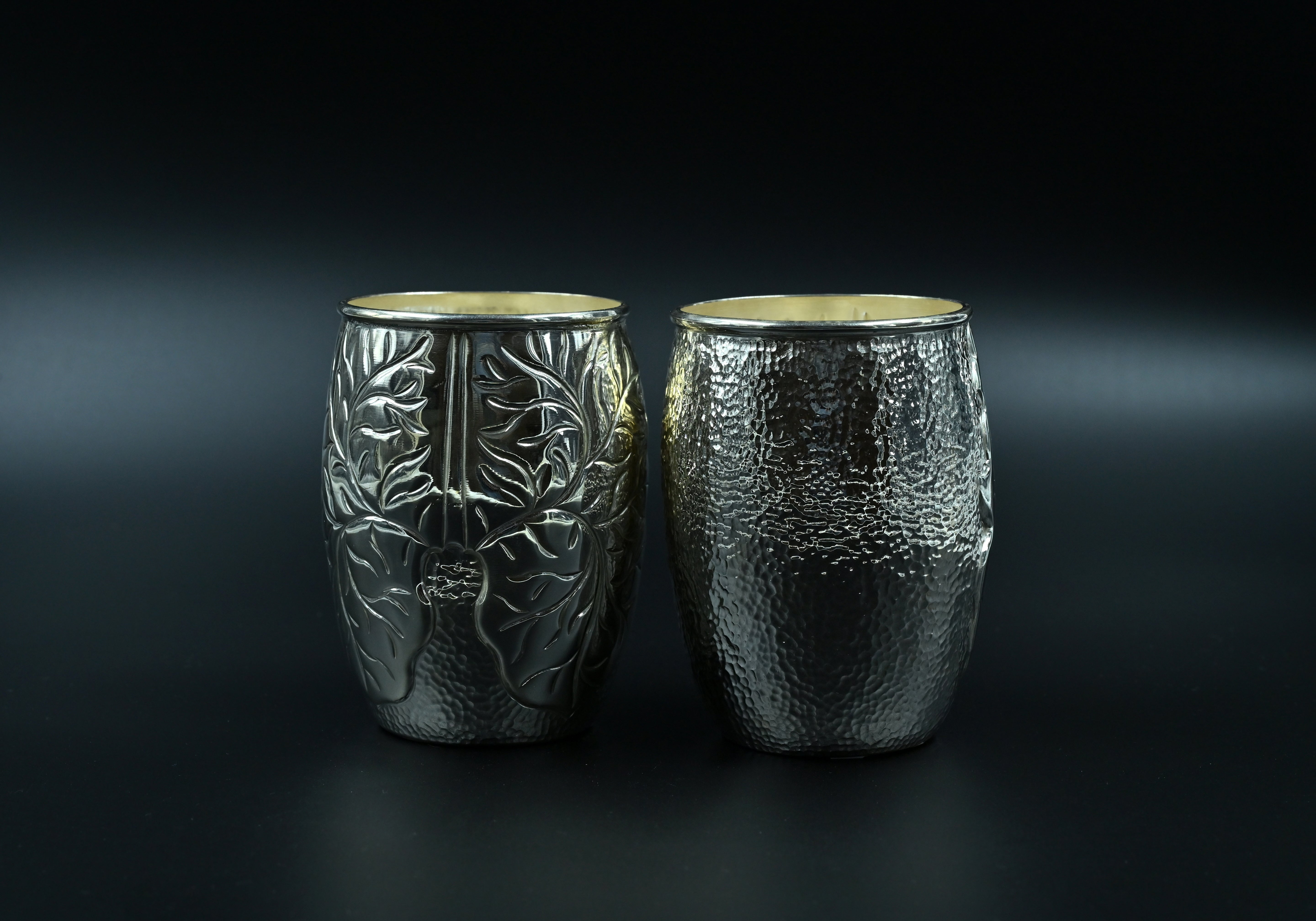 Elegant silver jug and glasses set for drinks



