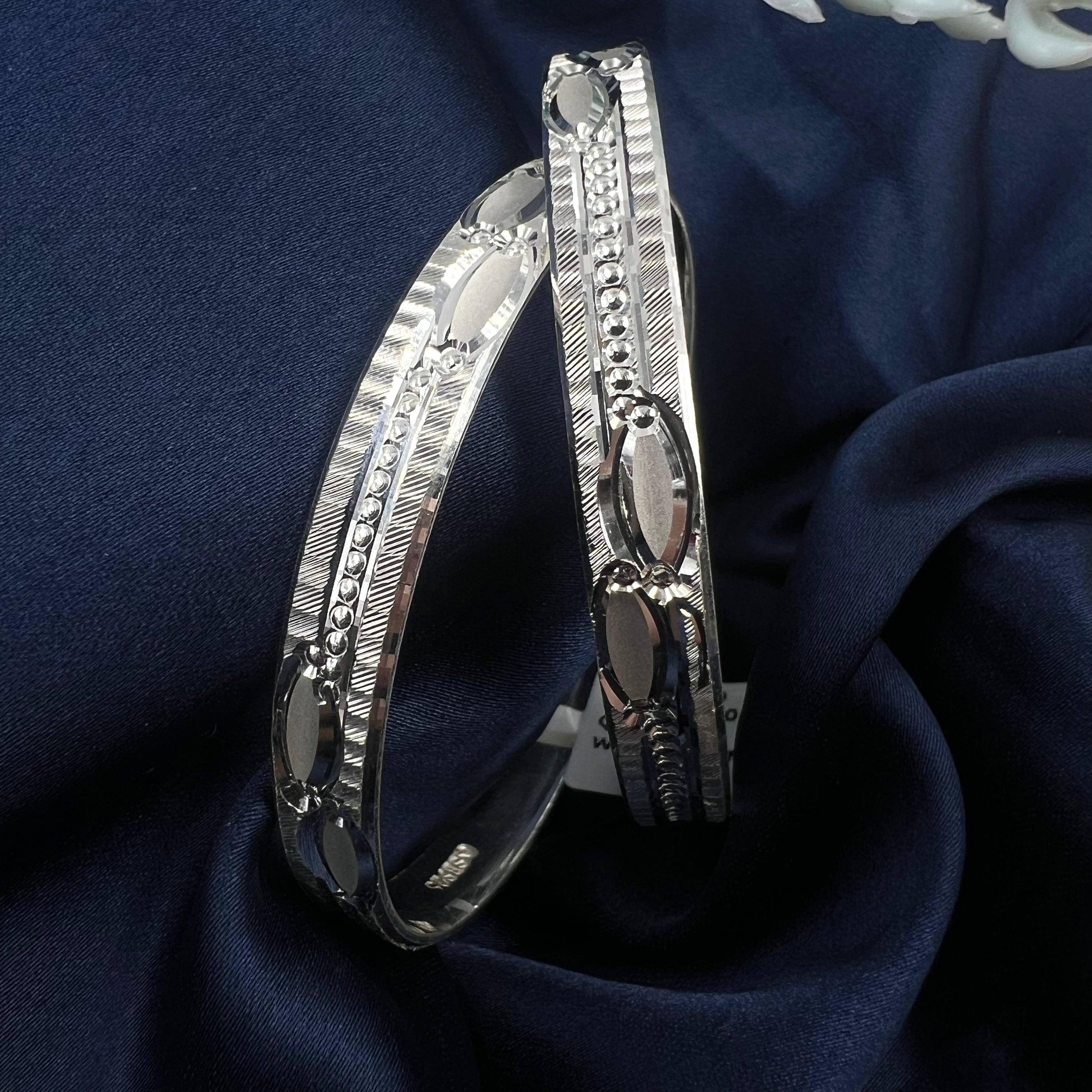 ladies modern silver bangles
