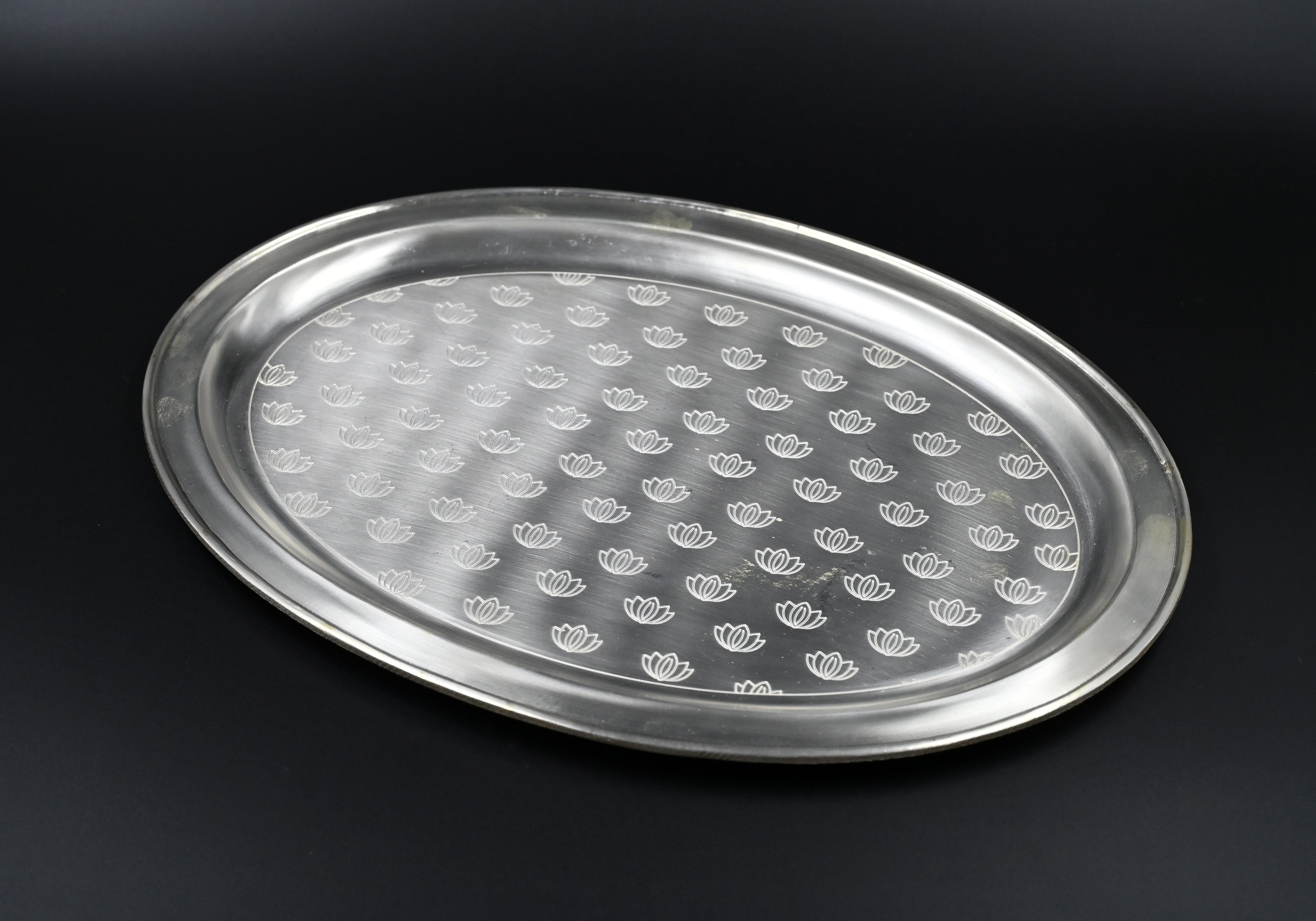 Detailed view of Padma glass and tray set
