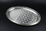 Detailed view of Padma glass and tray set