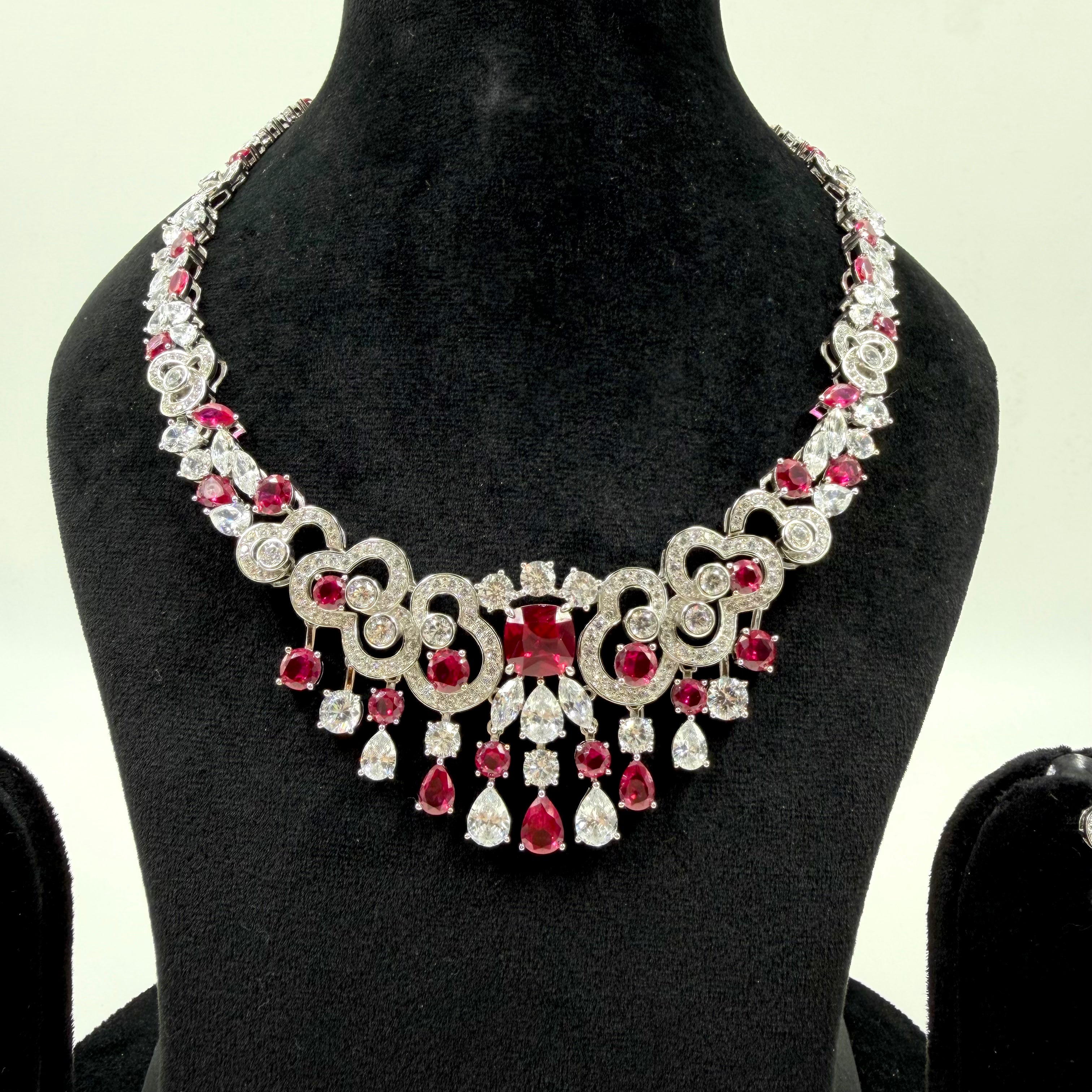 Silver chain necklace with red pendant