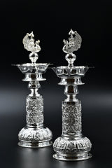 Silver peacock candle holder pair