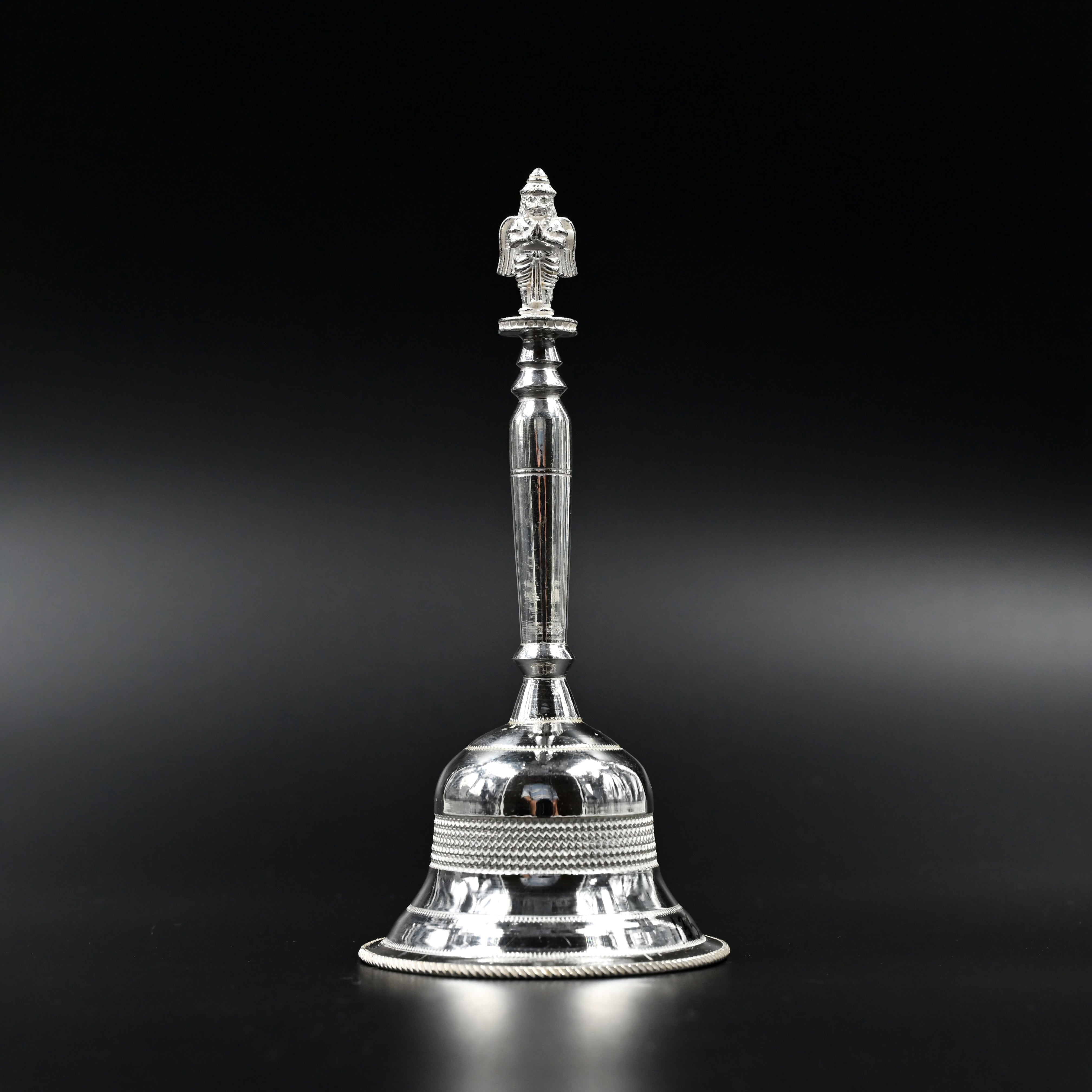 Silver pooja bell with deity handle